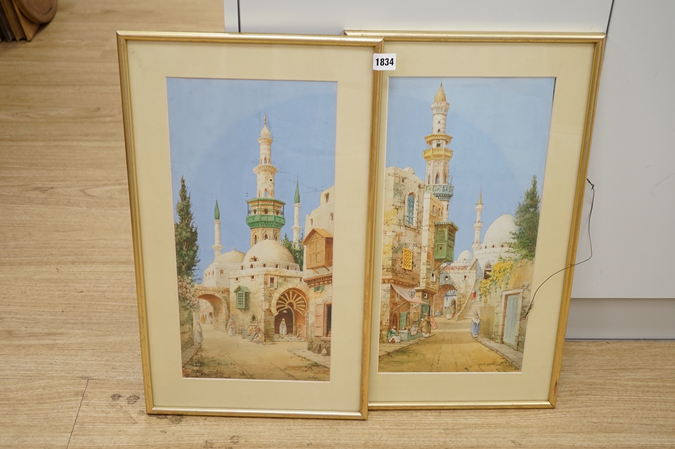 James Greig (1861-1941), pair of Orientalist watercolours, Middle eastern street scenes with mosques, each signed, 47 x 22cm. Condition - good